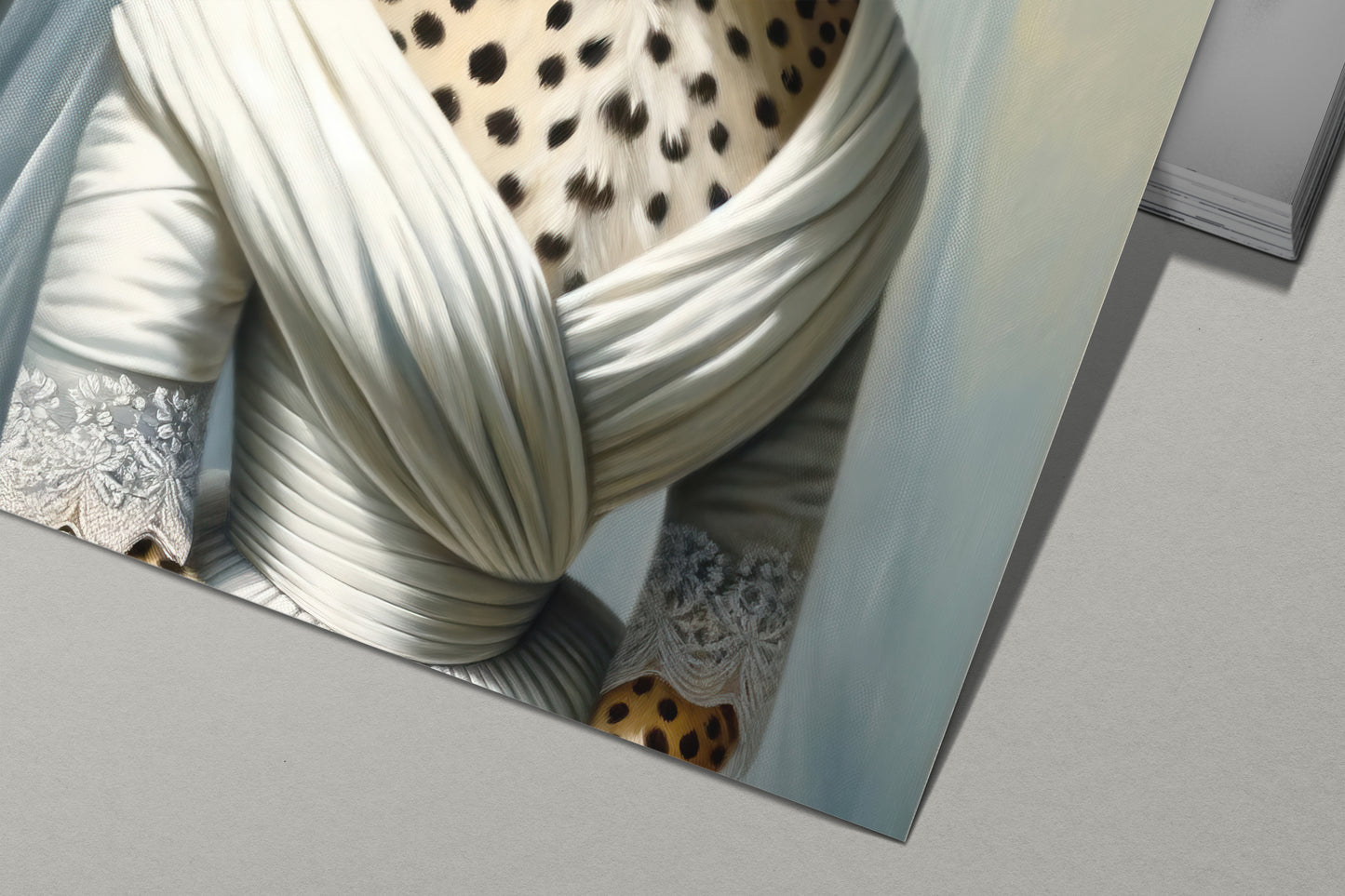 Detail of the cheetah in wedding dress poster: crossed white drape and lace sleeves