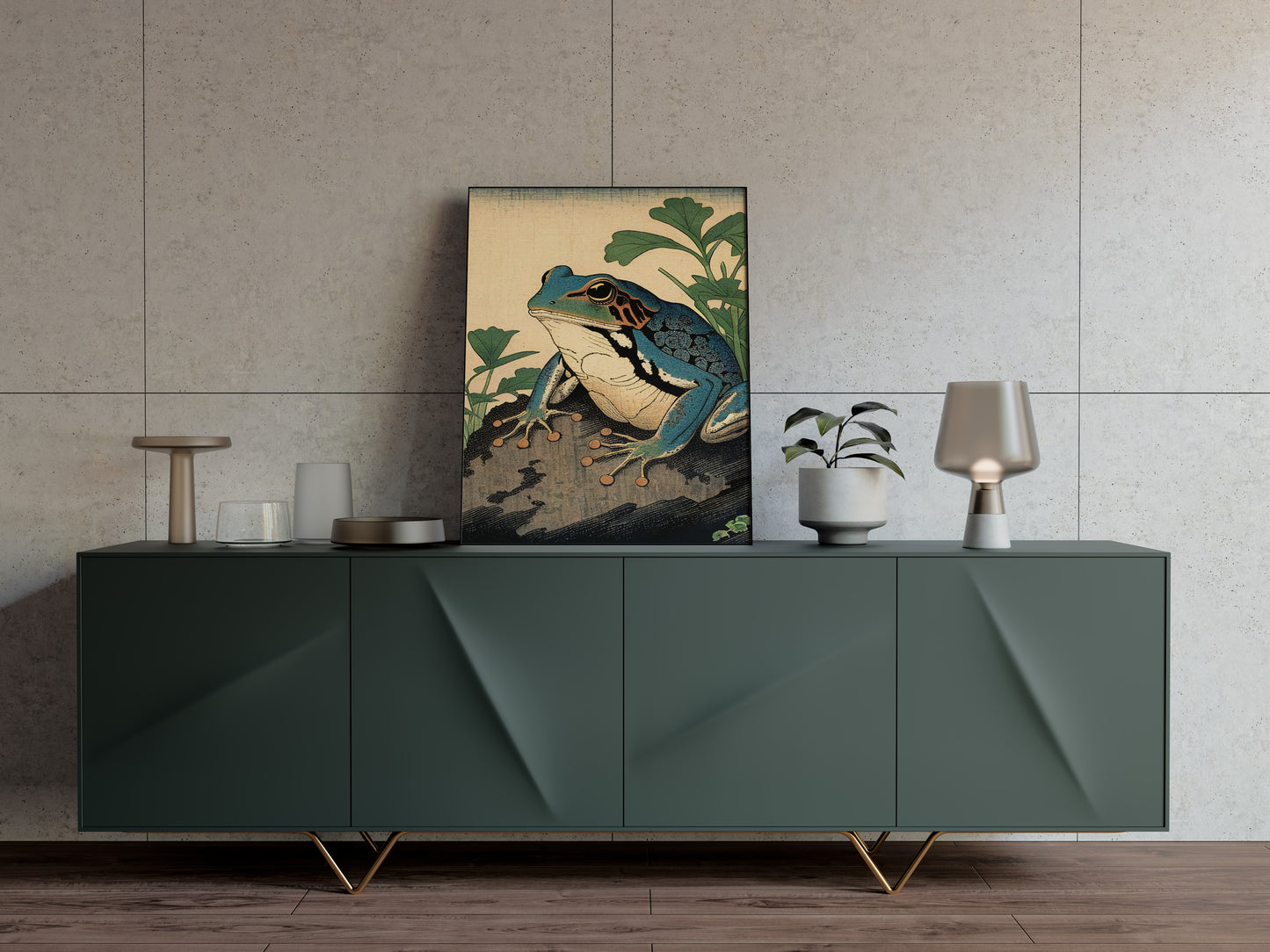 Poster grenouille art japonais posé sur un buffet vert sapin, mur beige texturé