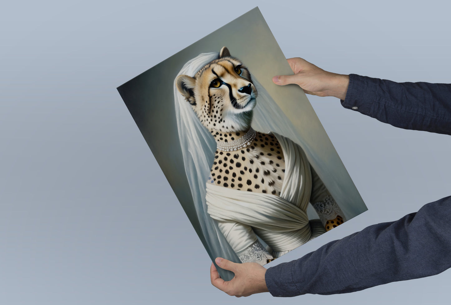 Cheetah bride poster held in both hands against a blue-gray background