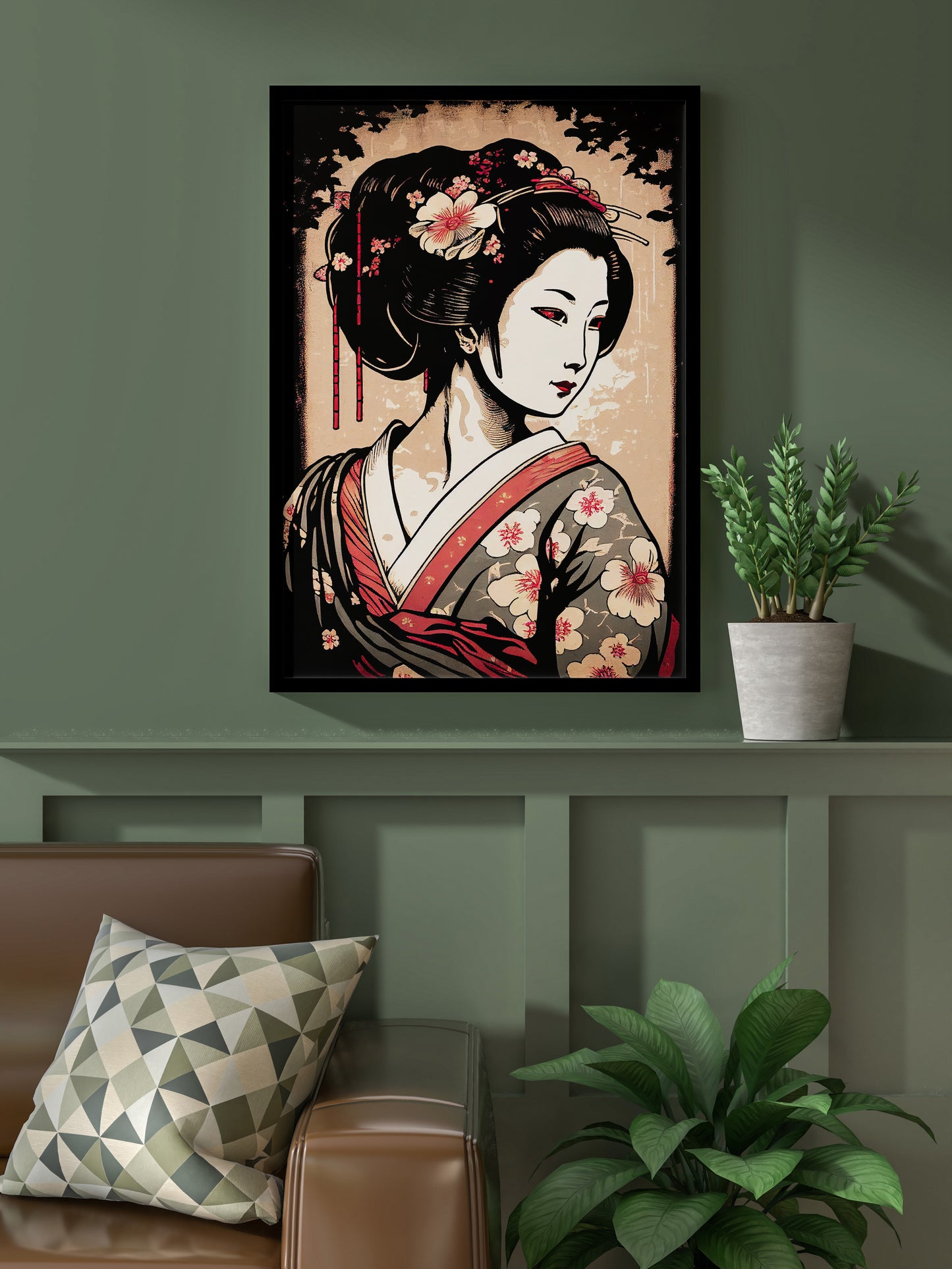 Poster geisha, cadre noir, sur un mur vert olive au-dessus d'un canapé en cuir