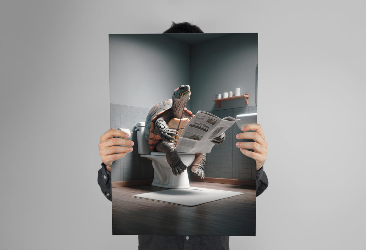 Turtle bathroom humor poster held in two hands in front of a plain gray backdrop