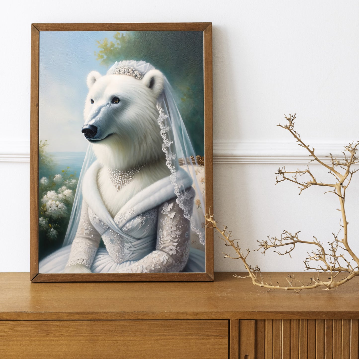 Polar bear in wedding dress poster in a dark wood frame on a wooden sideboard with a decorative branch