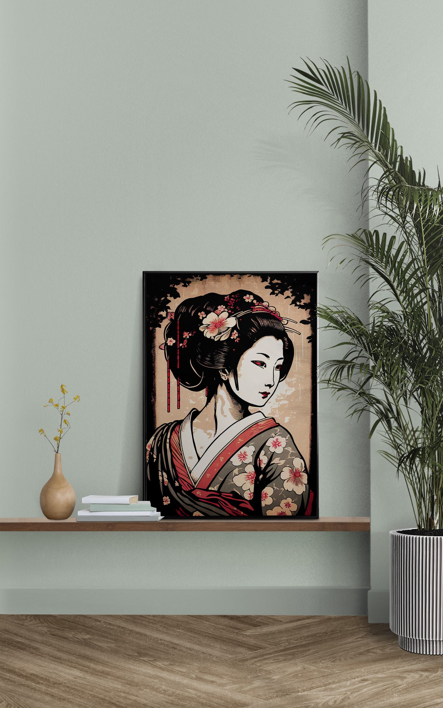 Poster geisha posé sur une étagère murale, mur vert sauge et palmier
