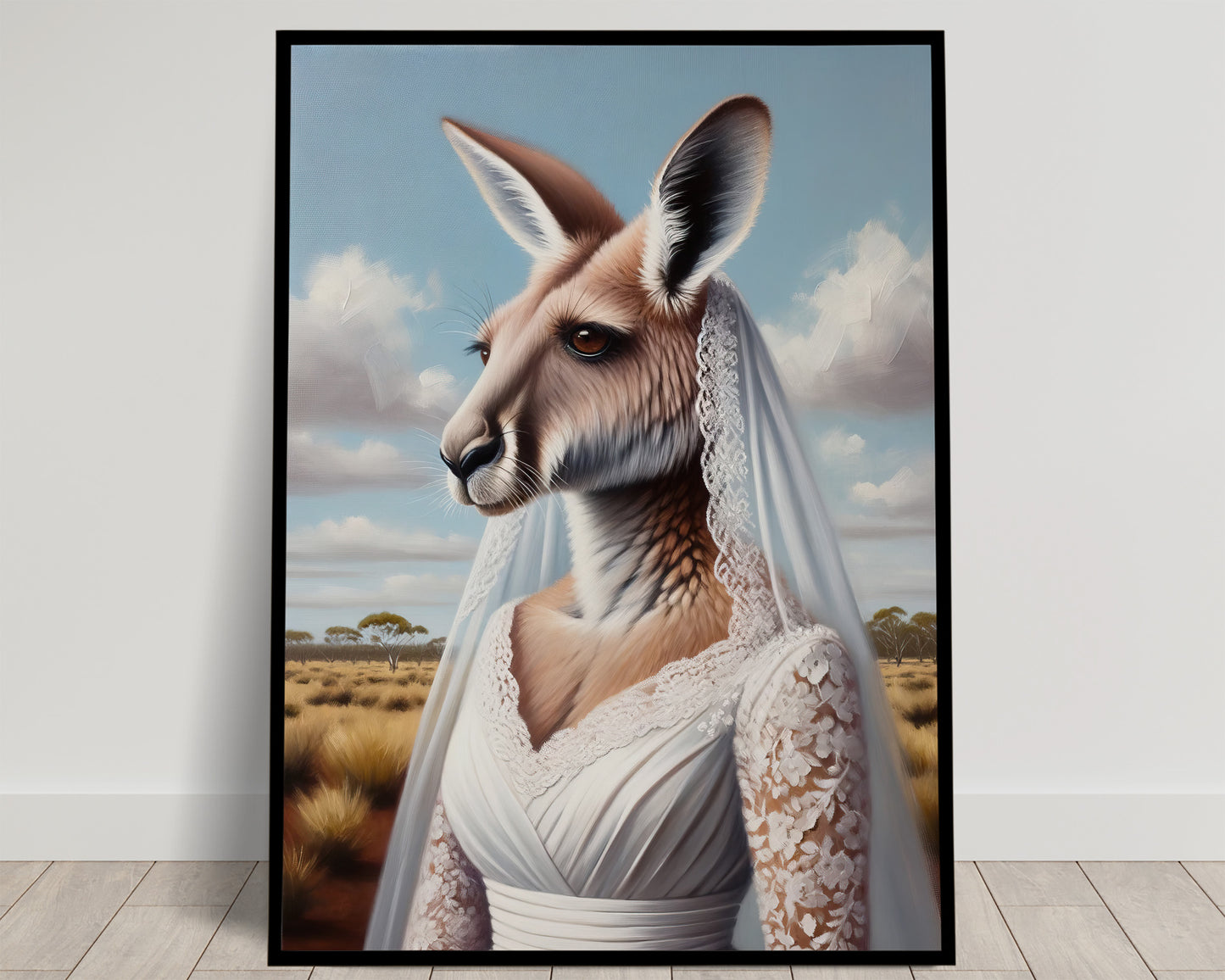 Portrait d'un kangourou en robe de mariée à manches de dentelle et voile, paysage d'outback et ciel bleu, cadre noir