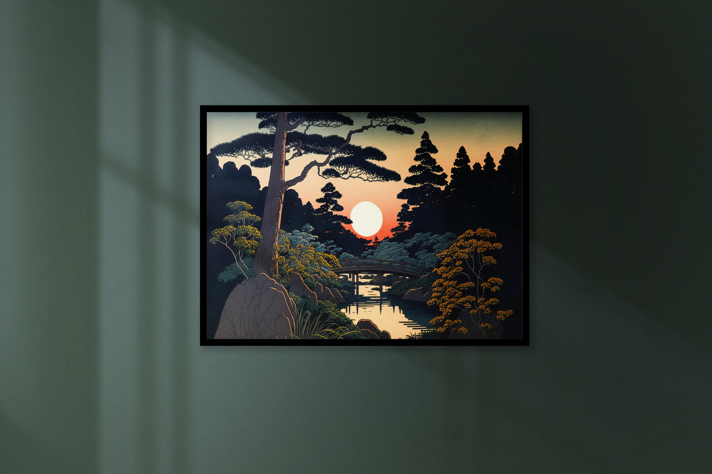 Poster jardin japonais en cadre noir sur un mur vert foncé