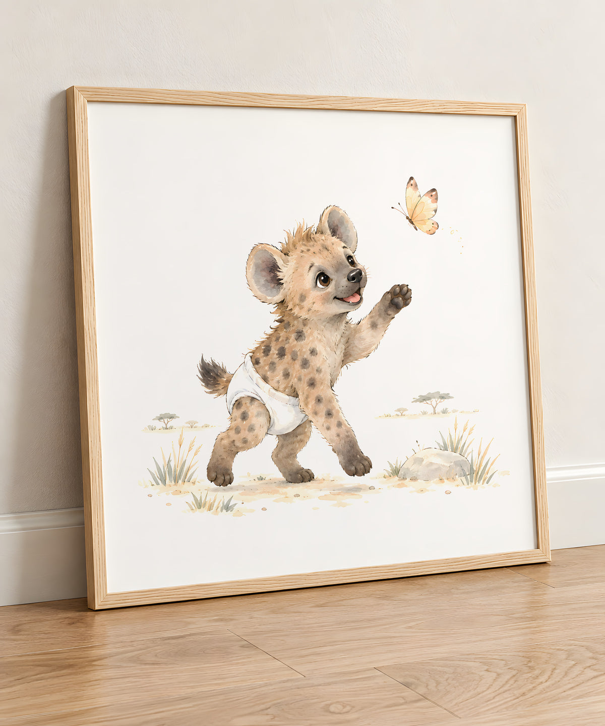 Baby Hyena in a White Diaper Tries to Catch a Butterfly: natural wood frame, 50 × 50 cm, styled in a room